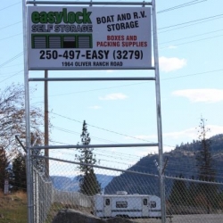 Custom sign integrated into fence