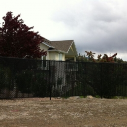 6 ft high black with privacy slats okanagan